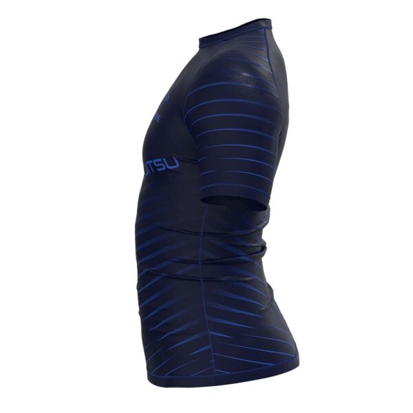 Close-up of fabric on jiu jitsu grappling rash guard, showing moisture-wicking properties.