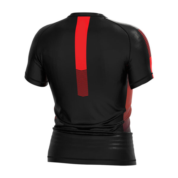 Rash guard jiu jitsu - close-up of polyester-spandex blend fabric, compression fit.